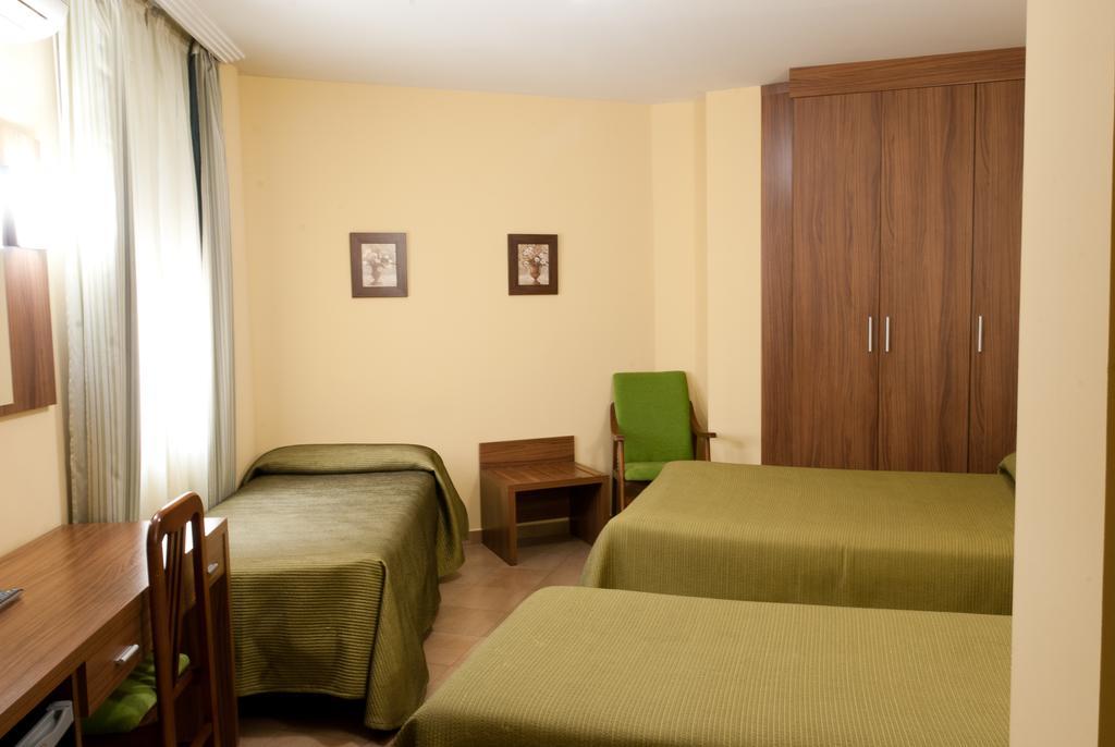 Hotel Hidalgo Quijada Алькасар-де-Сан-Хуан Экстерьер фото